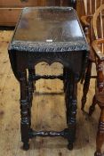 Victorian oak gate leg table with carved border, 78cm high by 91cm (leaves down).