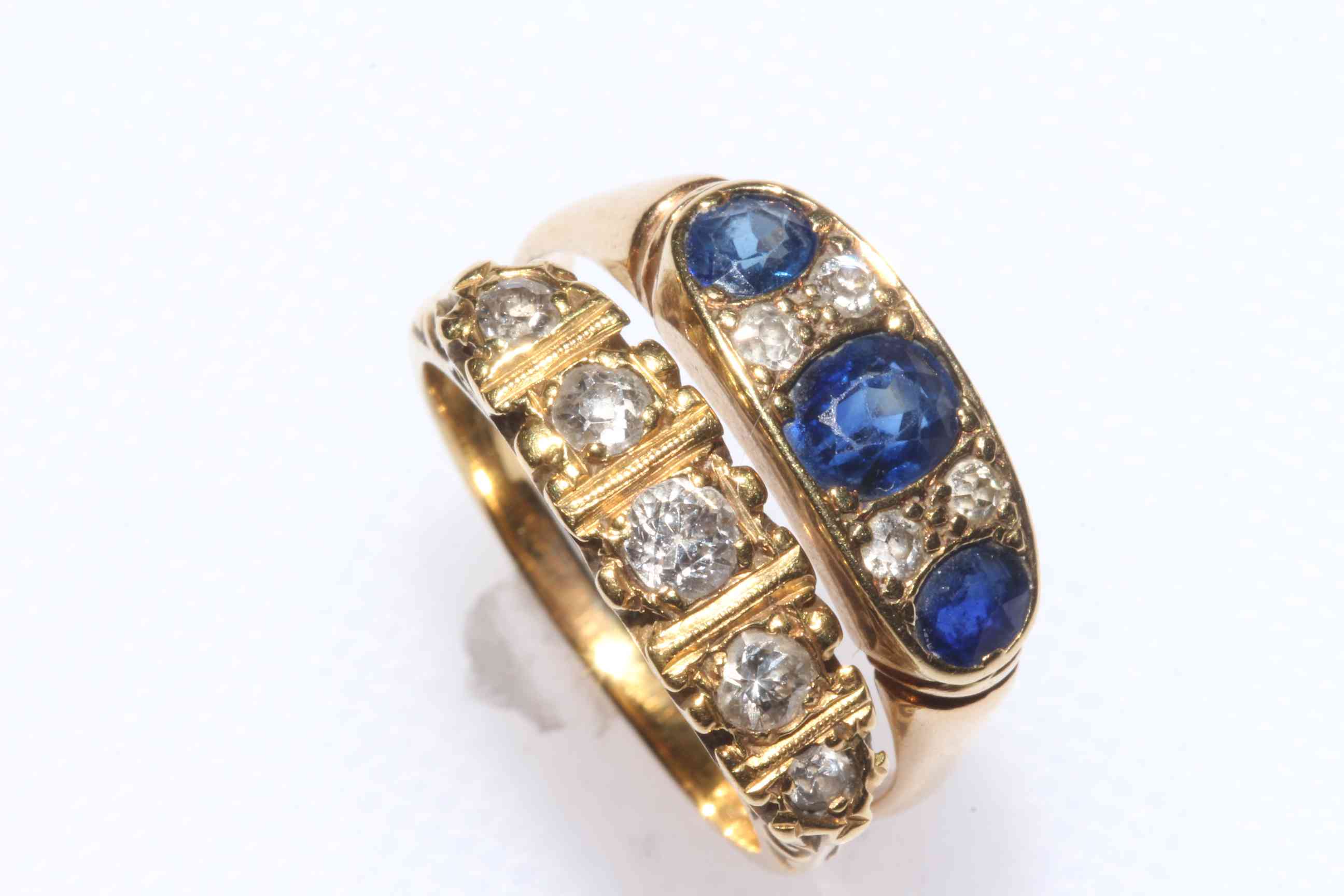 18 carat gold five stone diamond ring, size M, and unmarked sapphire and diamond ring, size O/P (2).