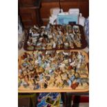 Two trays of Wade Whimsies, approximately 200 pieces together with Wade catalogues and boxes.