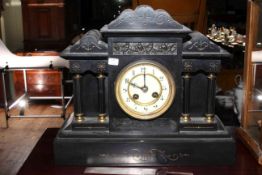 Late Victorian slate mantel clock with enamel dial, 36cm.