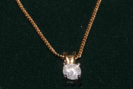 One carat diamond pendant with 9 carat gold chain, cased.