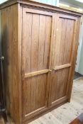 Pitch pin double door fitted cupboard, 184cm high by 130cm wide by 65cm deep.