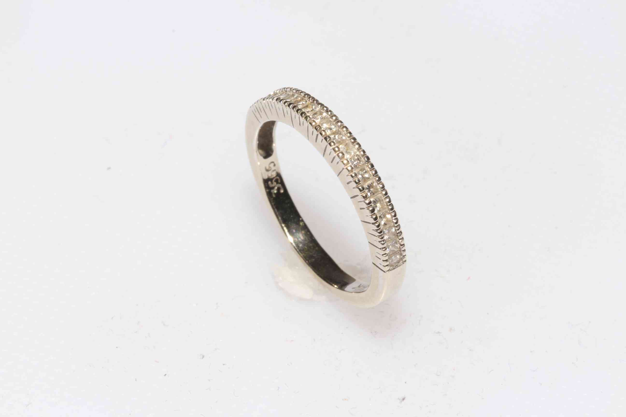 9 carat gold half eternity ring, size K/L.