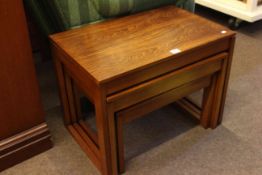 Rosewood nest of three table (largest 46cm high by 61cm wide by 41cm deep).