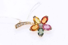 18 carat gold, diamond and coloured gem stone set flower brooch, 2.5cm length.