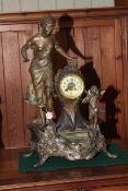 Ornate marble and spelter figural mantel clock decorated with maiden and cherub.