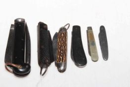 Collection of six pocket knives.