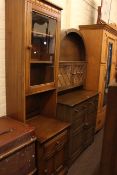 Slim Ercol glazed door cabinet, dome topped oak dresser and oak drop leaf dining table (3).