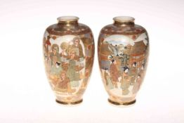 Pair Satsuma vases, each with two panels of figures, mark to base, 18.5cm high, with damaged stands.