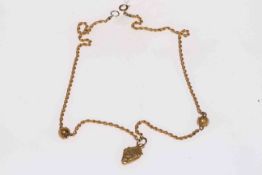 9 carat gold necklace with ingot, 39cm length.