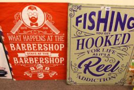 Two signs, Fishing and Barber Shop.
