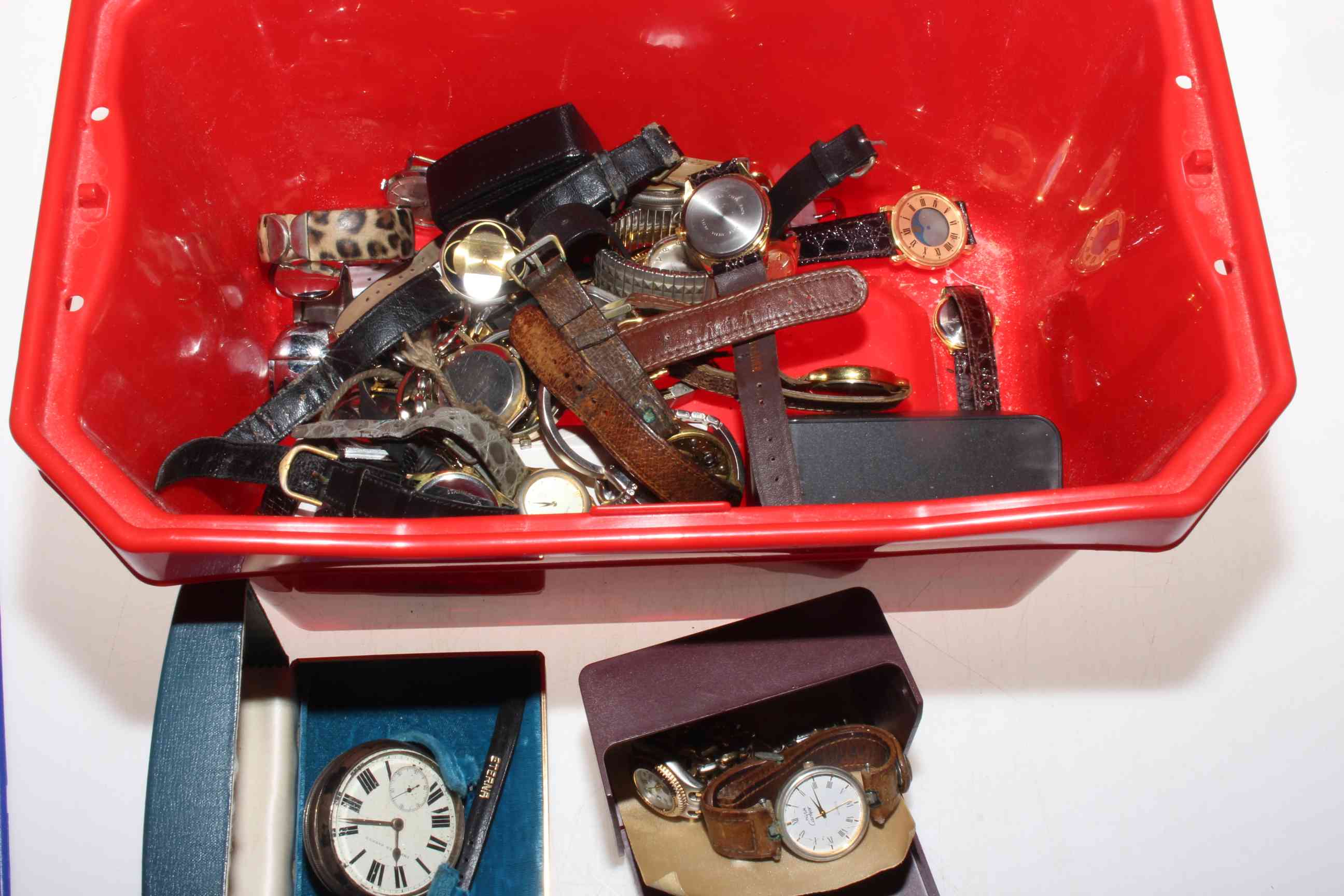 Box of contemporary wristwatches including silver pocket watch.