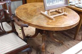 Victorian figure walnut and satinwood inlaid oval breakfast table on four turned pillars to four