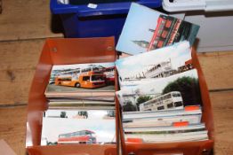 Two boxes housing albums and loose photographs, reproduction photos and printed postcards of buses,