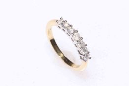 18 carat gold and seven stone diamond ring, size M.