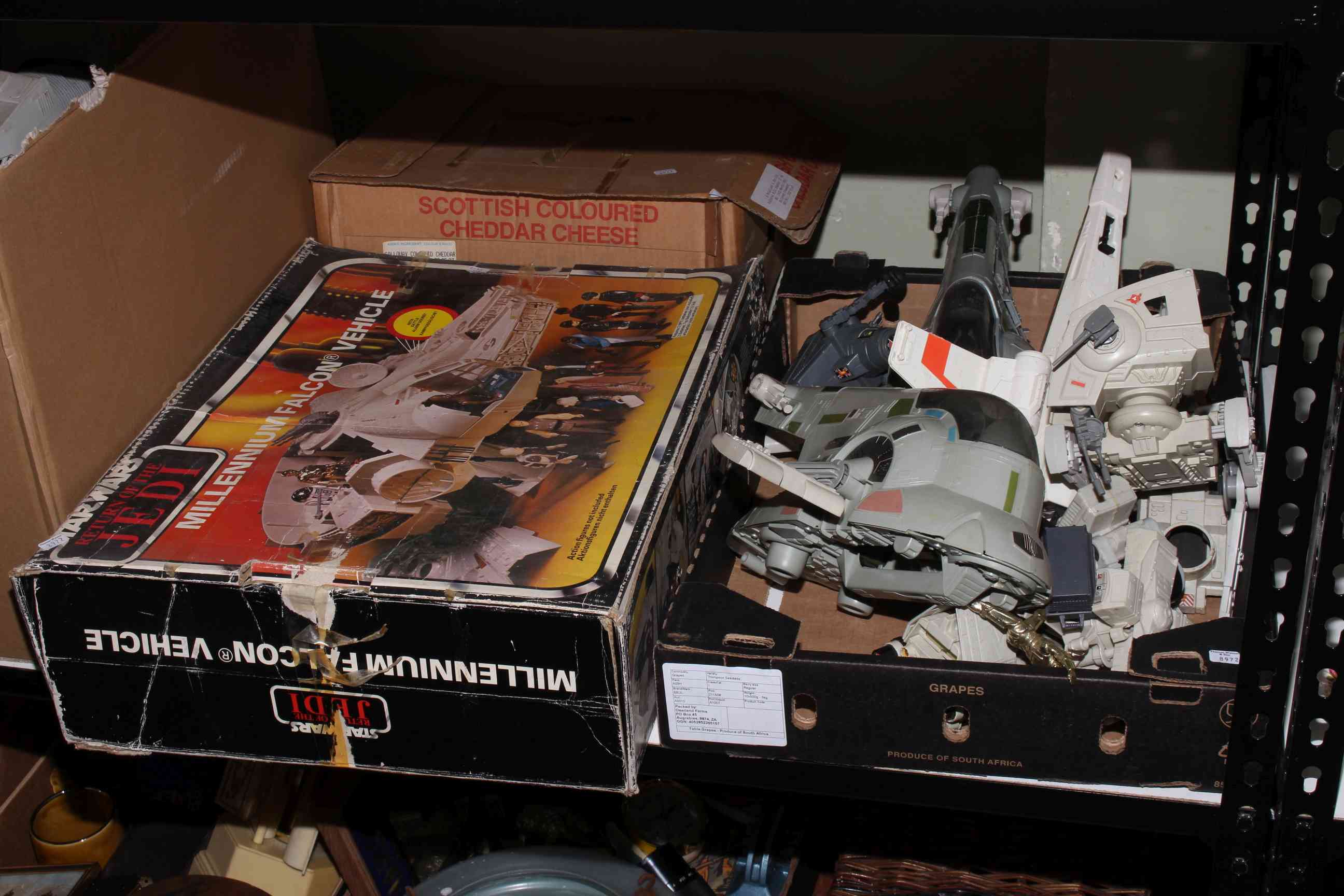 Collection of Star Wars toys including Return of the Jedi, Millennium Falcon, Storm Trooper in case,