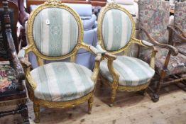 Pair French gilt carved oval panel back fauteuils.