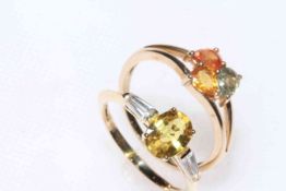 9 carat gold, yellow sapphire and zircon ring, and 9 carat gold three colour sapphire ring (2).