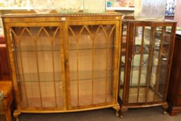 Two door and single door china cabinets on cabriole legs (2).