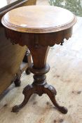 Victorian inlaid circular walnut sewing table on pedestal triform base, 73cm high by 46cm diameter.
