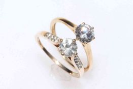 Two 9 carat gold solitaire zircon rings, both size P/Q.