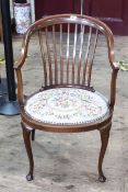 Edwardian inlaid mahogany occasional open armchair with floral needlework seat.