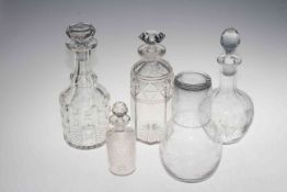 Four glass decanters and stoppers, etched glass carafe and glass, large collection of coins,