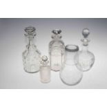 Four glass decanters and stoppers, etched glass carafe and glass, large collection of coins,