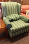 Wesley Barrel wing easy chair in green striped fabric.