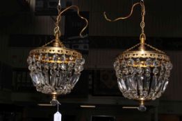 Pair of early 20th Century cut glass light fittings.