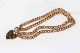 9 carat gold double chain link bracelet with padlock fastener.