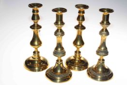 Two pairs of Victorian brass candlesticks and copper kettle.