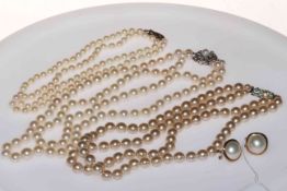 Two strand uniform pearl necklace with 14k white gold clasp,