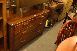 1920's mahogany kidney shaped dressing table, stained four drawer chest, adjustable footstool,