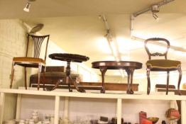 Two Victorian mahogany side chairs, low mahogany snap top table and oval mahogany coffee table (4).