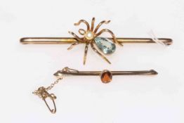 Large 9 carat gold 'bug' brooch, 7.5cm across and 9 carat gold citrine bar brooch (2).