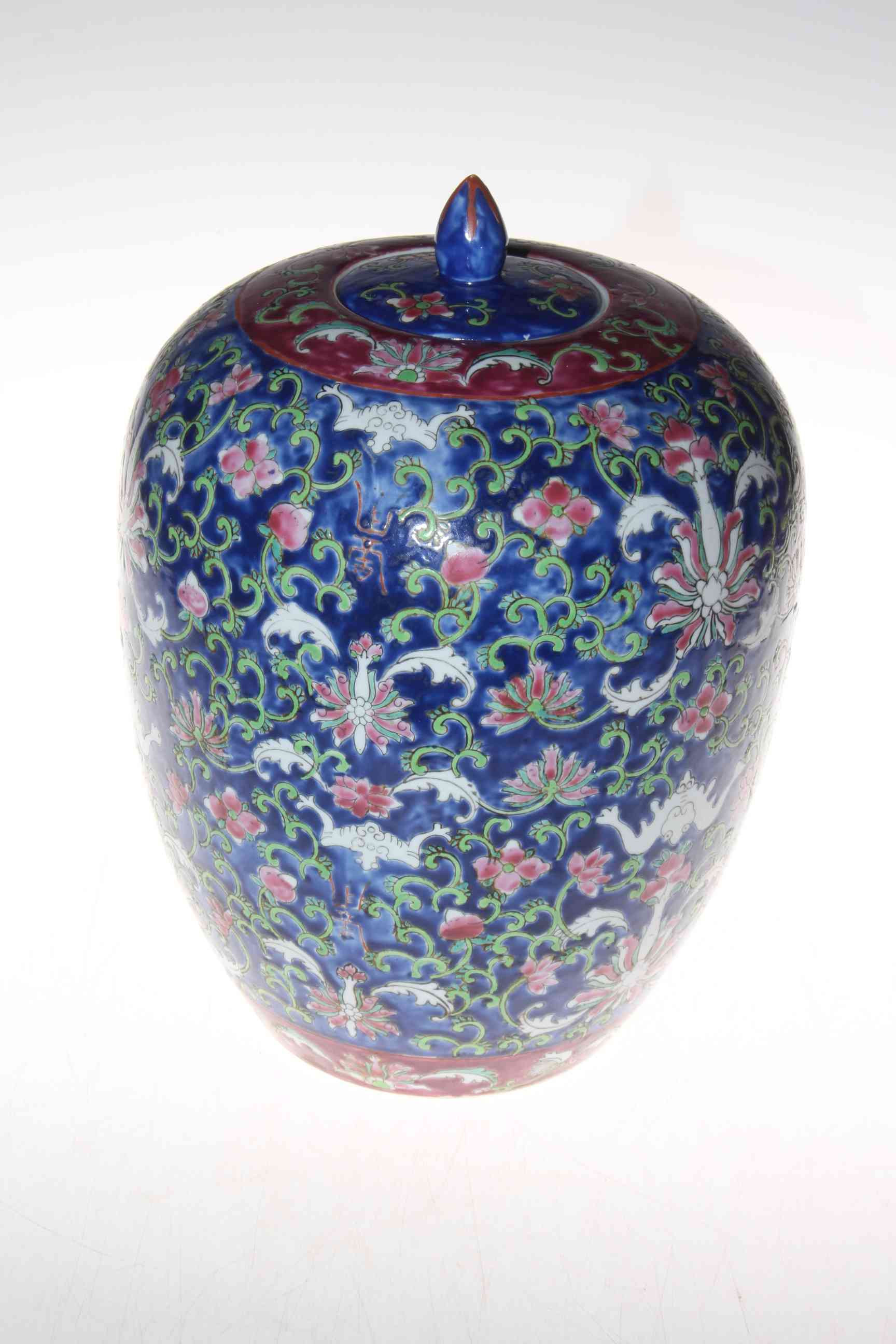 Oriental floral lidded jar, 30cm high.