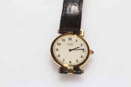 Cartier de Must silver gilt ladies wristwatch with leather strap, serial no.