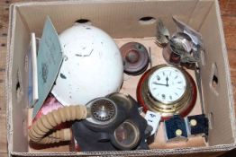 Box of collectables including Military gas mask, helmet, fishing reel, three Bols houses, clock,