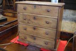 Victorian pine apprentice chest of four drawers, 47cm high by 48cm wide by 24cm deep.