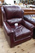 Wade Additions burgundy leather armchair.