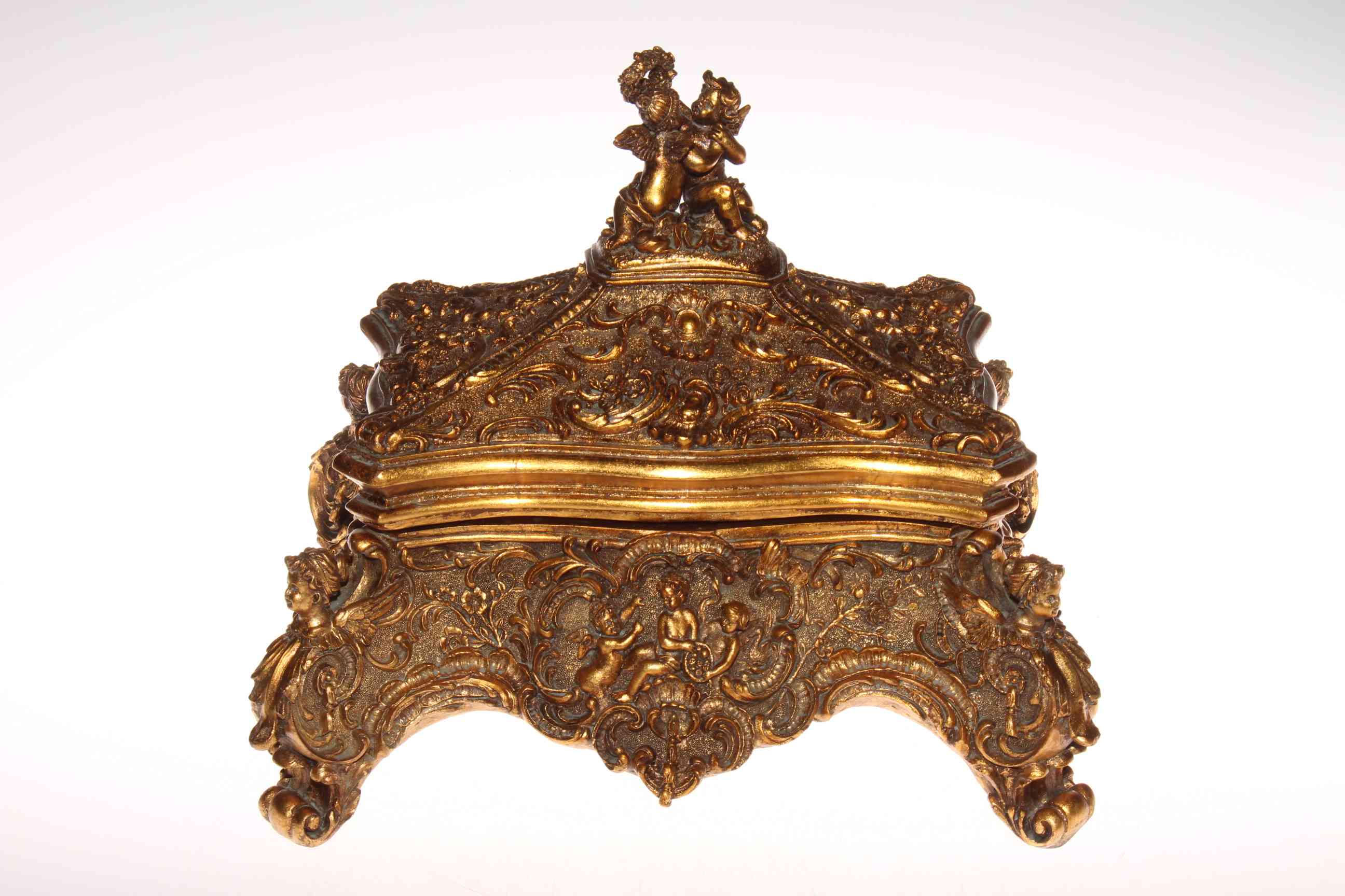 Gilt rococo style casket with cherub decoration, 34cm by 30cm.