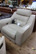 Light mink leather electric reclining armchair.