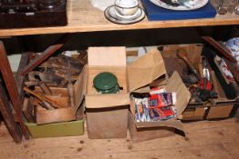 Wood planes, saws, blow lamps, paraffin heater, vintage Phillips stick on soles, etc.