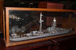 Model ship in glass framed case, 96cm by 34cm by 15cm.