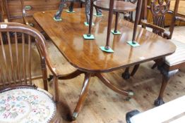 19th Century rectangular mahogany breakfast table on turned pedestal to four splayed legs,