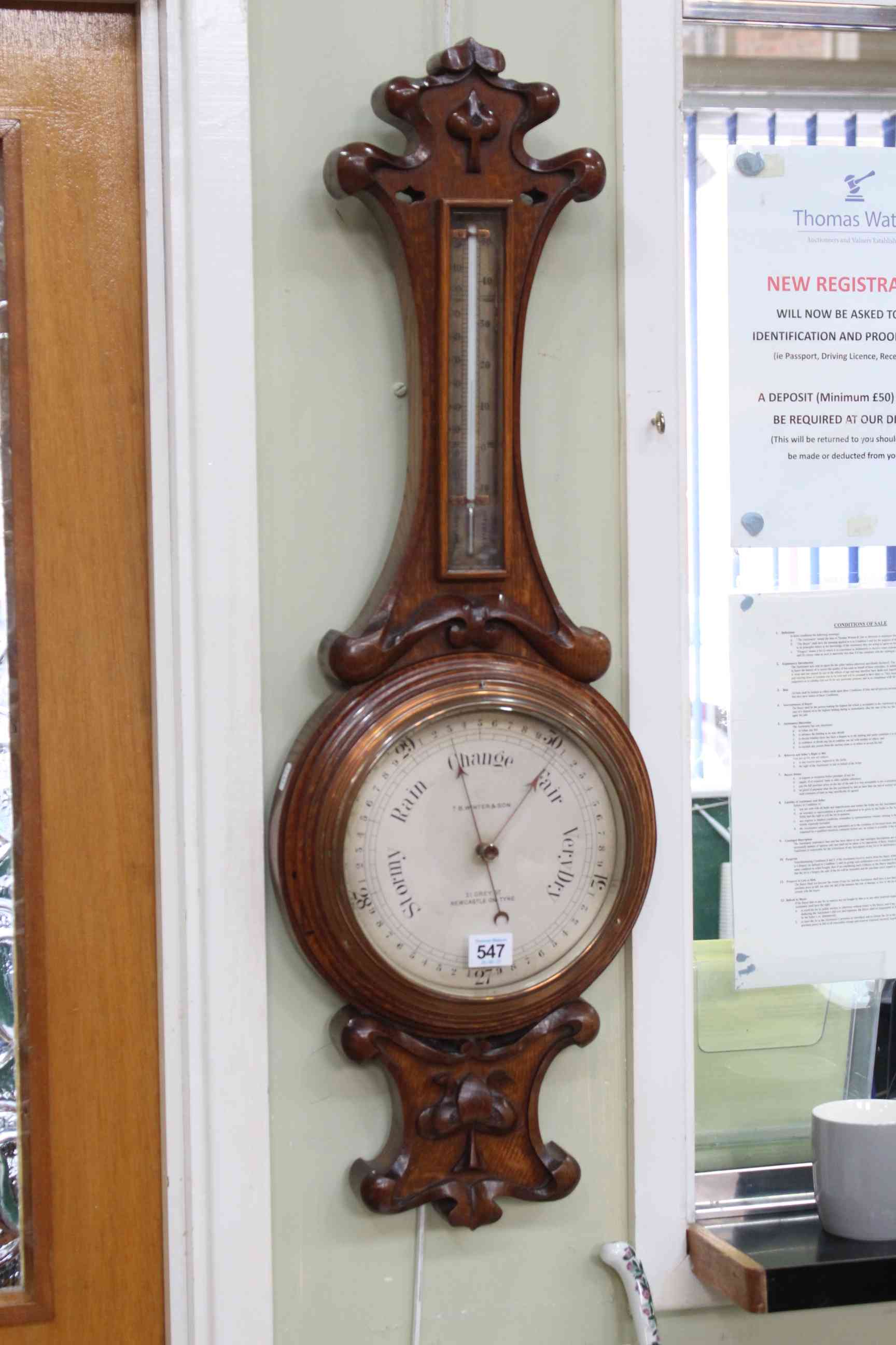 Carved oak banjo barometer, T.B. Winter & Son, Newcastle.