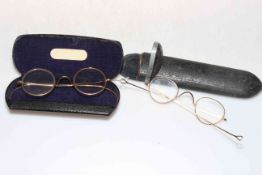 Two cased pair of vintage spectacles.