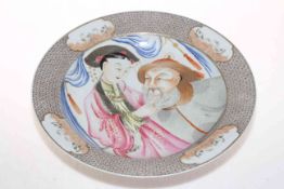 Large Chinese early 19th Century charger painted with bearded man and lady, 31cm diameter.