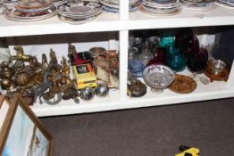 Assorted clear and coloured glass, brass and metalware, horsebrasses, vintage movie camera, etc.